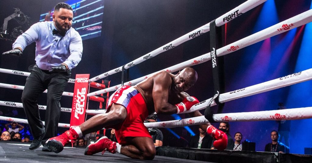 Trump Talked as Holyfield Got Pummeled. Just Another Day in Boxing’s Absurd Summer.