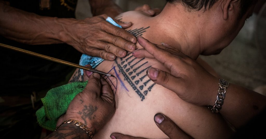 inside the thai temple where tattoos come to life