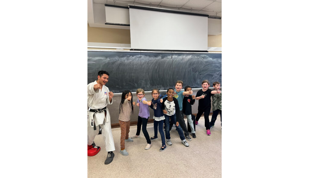 Rickyjon Balgenorth teaching karate to elementary school students with the Purdue Karate Club copy