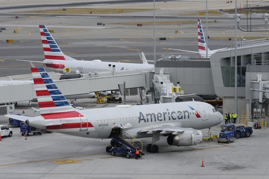 American Airlines flight pulls U-turn after passenger tries opening exit door