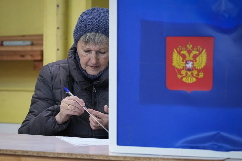 Russians cast ballots in an election preordained to extend President Vladimir Putin's rule