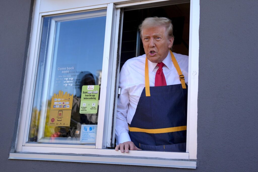 Trump offers up McDonald's photo on shirt: 'McGift'