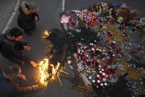 Hundreds hold vigil for victims of roof collapse in northern Serbian city